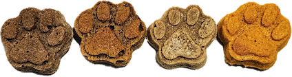 Multiple flavors of dog treats made from oat flour, beef, chicken, cheese, and peanuts